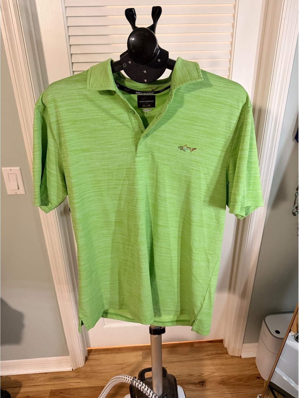 Greg Norman green short sleeve polo shirt